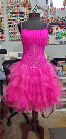 Pink Glinda themed figure skating dress