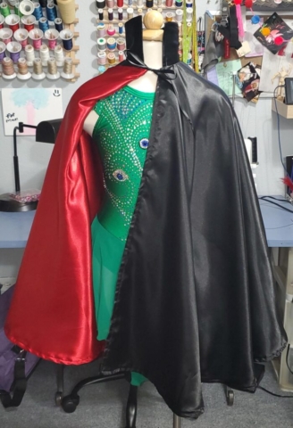 Black satin magician cape with red satin lining