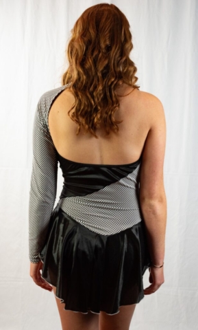 back view of black and white figure skating dress