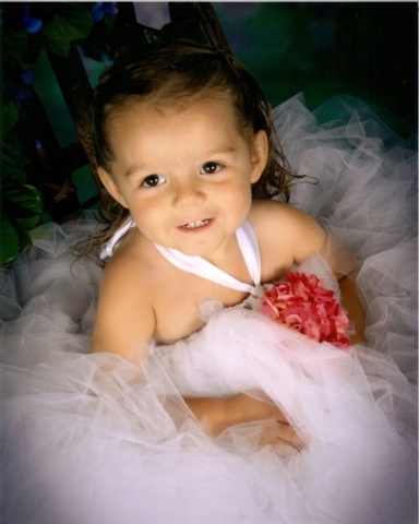 girl wearing a tutu flower girl dress