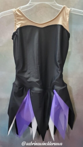 Black, purple and white figure skating dress