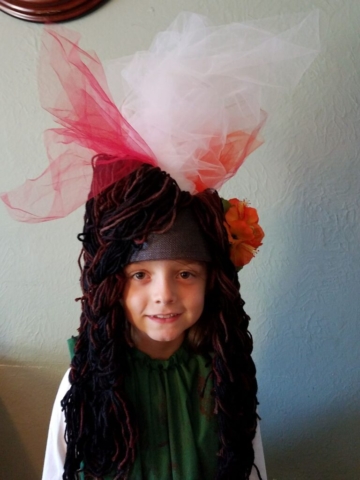 girl wearing a volcano themed headdress