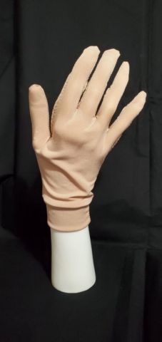 nude glove designed for figure skaters