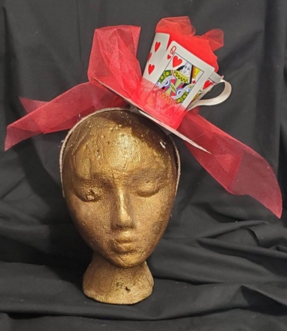 Red queen of hearts tea cup fascinator