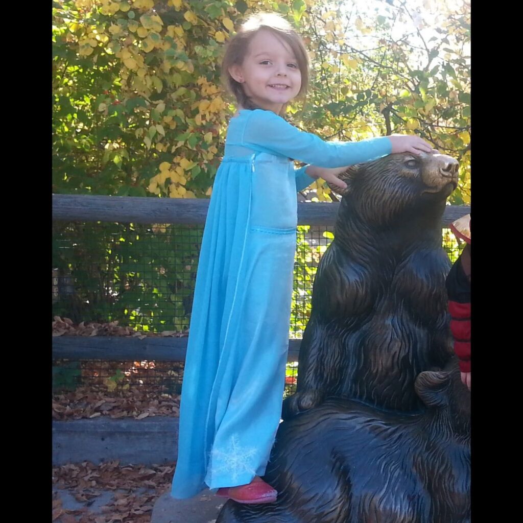 Young girl dressed as Elsa from Frozen