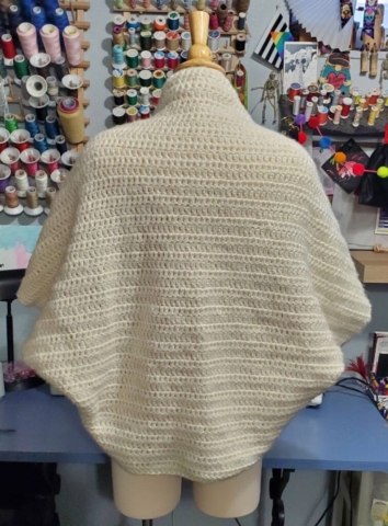 Back View of Crocheted Sweater Shrug out of Cream Colored yarn