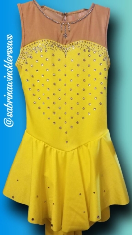 yellow figure skating dress with rhinestone detail