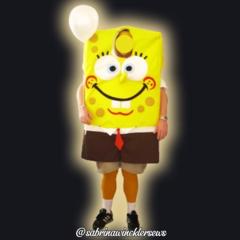 Man wearing sponge bob costume holding a balloon.